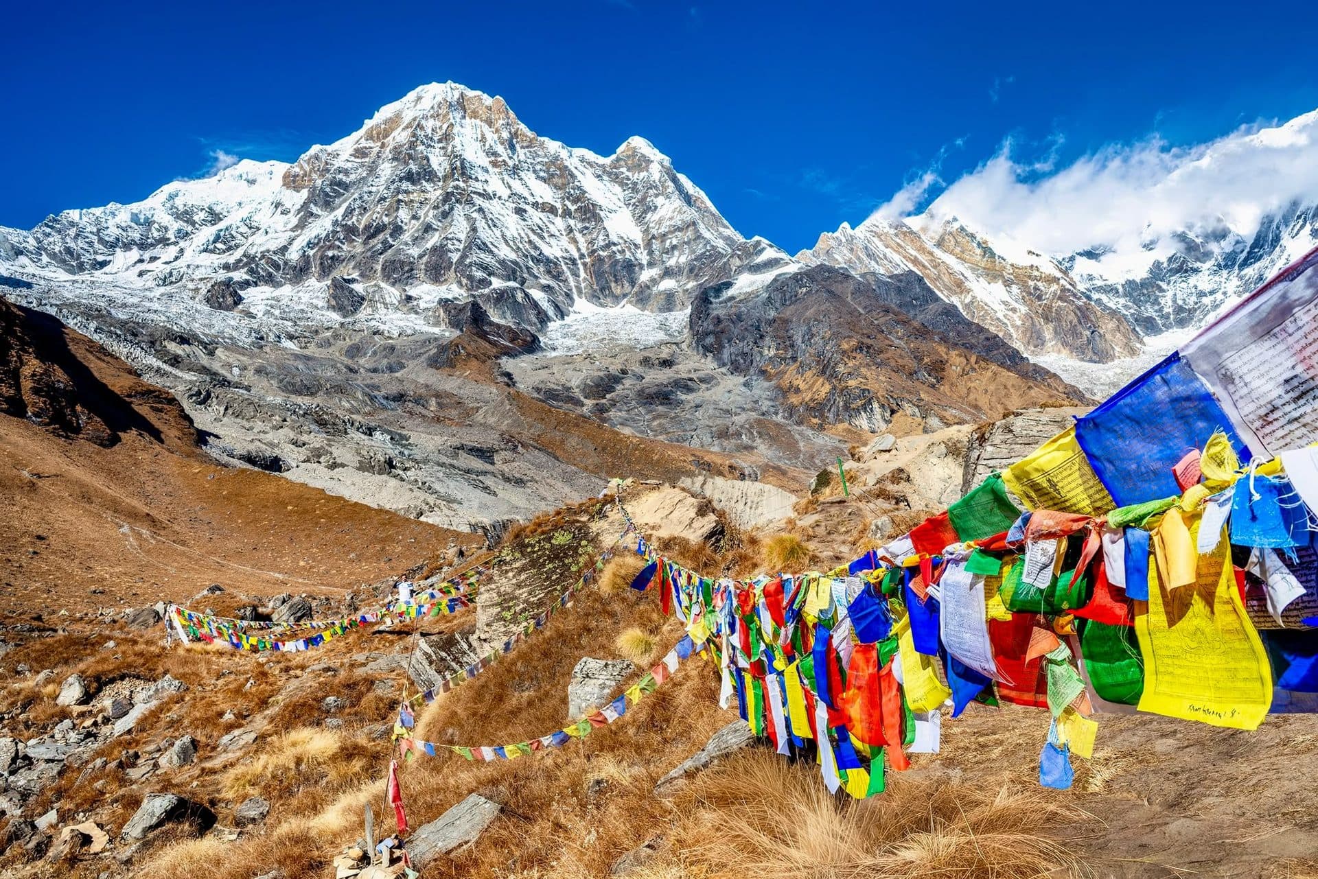 Annapurna Base Camp in clear sky with prayer flags